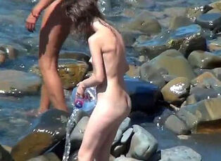Beach voyeur demonstrates us some nude teenage nudists.
